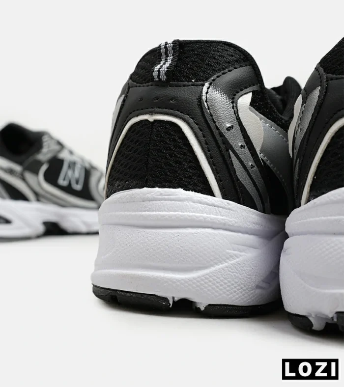 کفش کتانی مردانه و زنانه مشکی نقره ای NEW BALANCE 530 مدل 5508 - Image 6