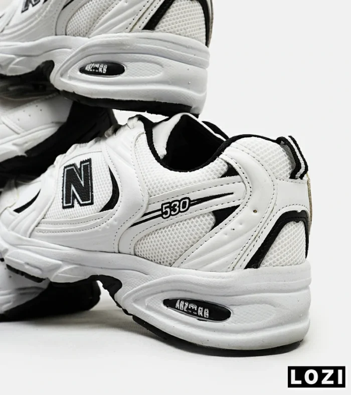 کفش کتانی مردانه و زنانه سفید مشکی NEW BALANCE 530 مدل 4974 - Image 9