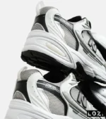 کفش کتانی مردانه و زنانه سفید طوسی مشکی NEW BALANCE 530 مدل 6642 - Image 8