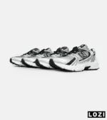 کفش کتانی مردانه و زنانه سفید طوسی مشکی NEW BALANCE 530 مدل 6642 - Image 6