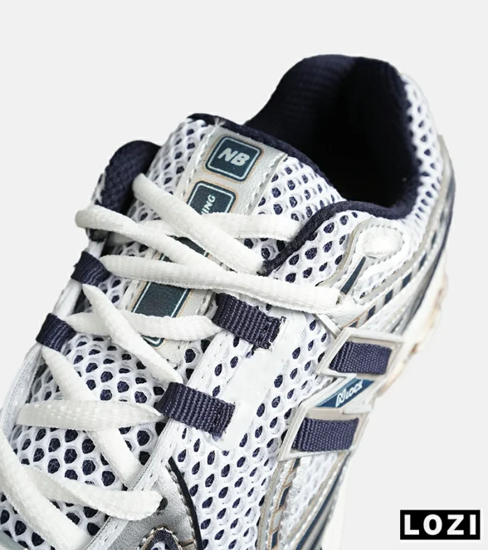 کفش کتانی مردانه و زنانه سفید سرمه ای NEW BALANCE 1064 مدل 8150 - Image 5