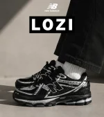 کفش کتانی مردانه و زنانه مشکی سفید New Balance 1906R مدل 7545 - Image 2