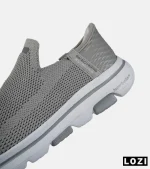 کفش کتانی طبی ورزشی طوسی SKECHERS Slip-Ins مدل 8857 - Image 4